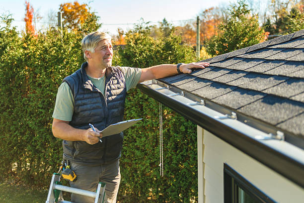 Professional Roofing technician working in Barco, NC